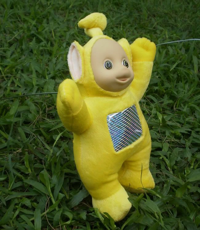 yellow teletubby doll