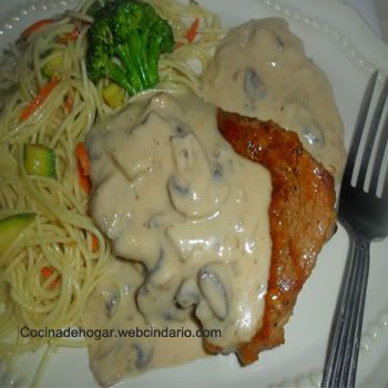 chuletas de cerdo con crema de champiñones